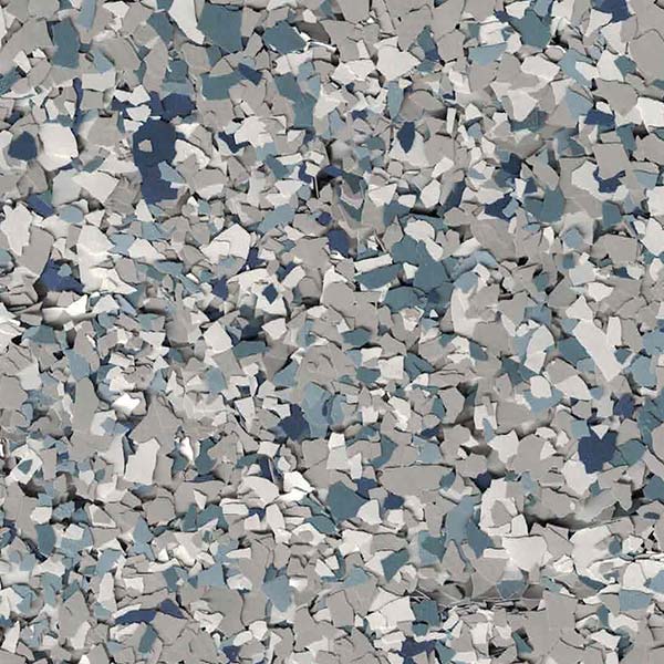 The image shows a collection of irregularly shaped fragments with varying shades of grey, white, and blue, resembling a texture or a collage of paper pieces.