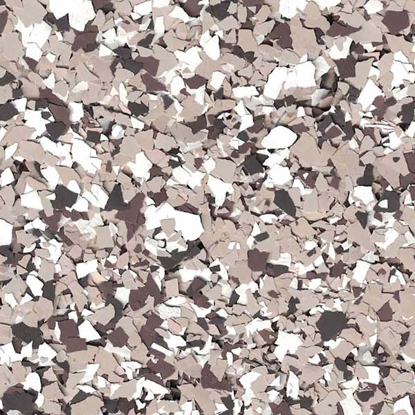 This is a close-up image of a surface with a speckled pattern, consisting of various shades of brown, white, and gray, resembling crushed stone or terrazzo.