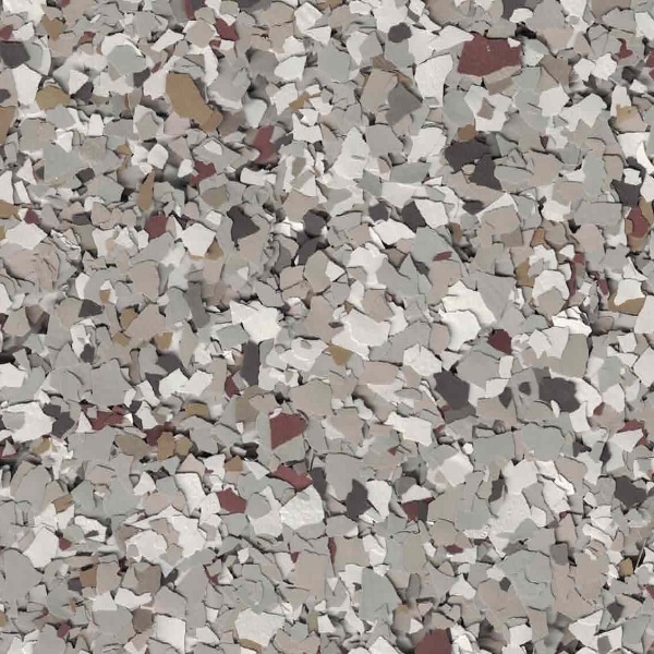 The image displays an assortment of irregularly shaped speckled stones or pebbles in various shades of gray, beige, brown, and white scattered densely.